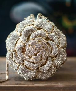 TRISH SCULLY ROSE GOLD CLUTCH